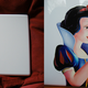 Illustration for article titled Snow White MacBook Cover Can Only Be Awakened With Steve Jobss Kiss